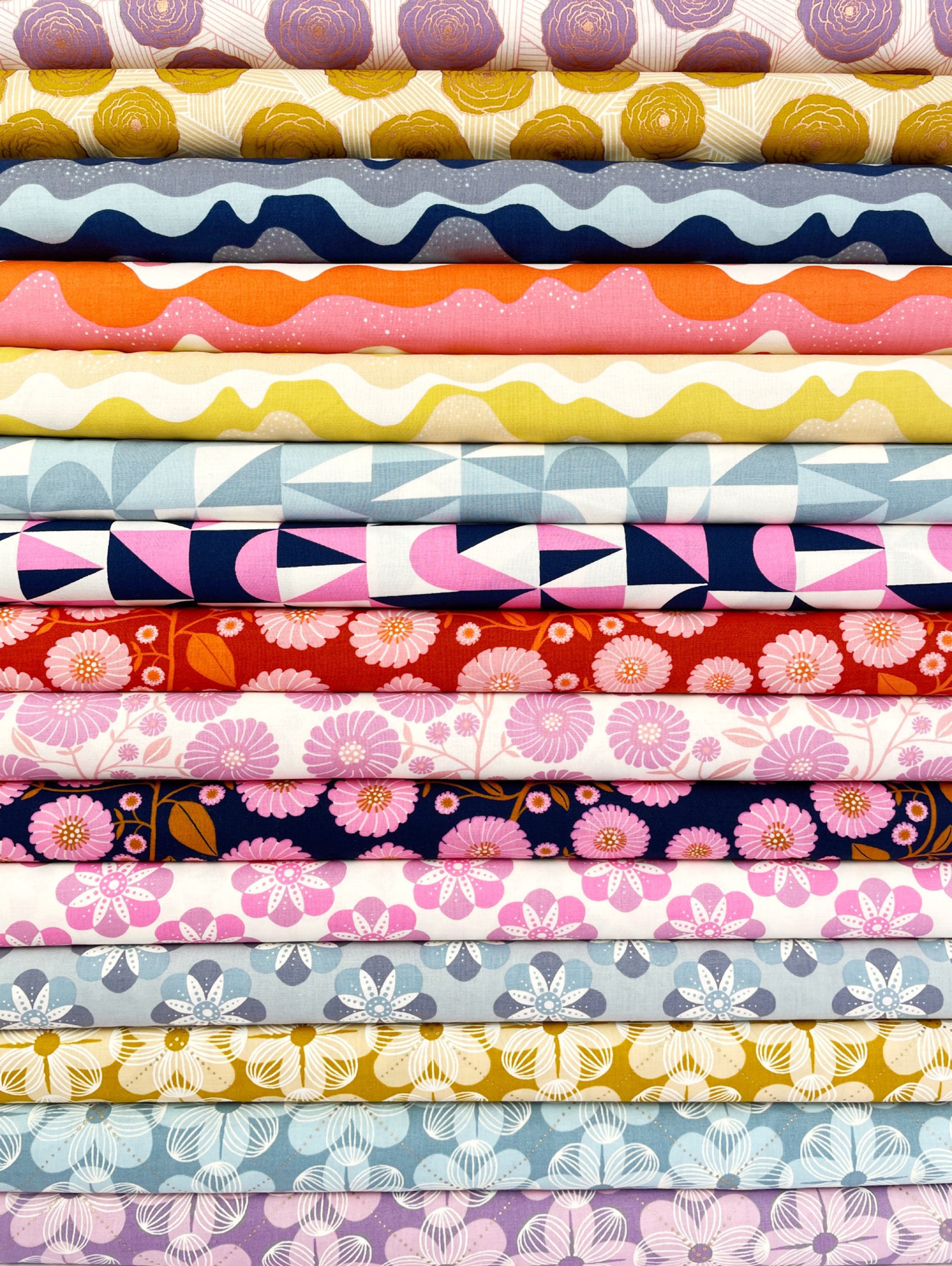 a selection of quilting fabric fat quarters to maximise variety of colours and prints in your quilts and projects